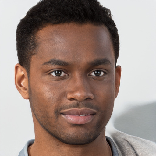 Neutral black young-adult male with short  brown hair and brown eyes