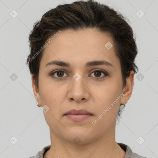 Neutral white young-adult female with short  brown hair and brown eyes