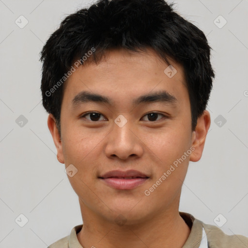 Joyful asian young-adult male with short  black hair and brown eyes