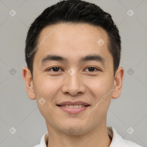 Joyful white young-adult male with short  black hair and brown eyes