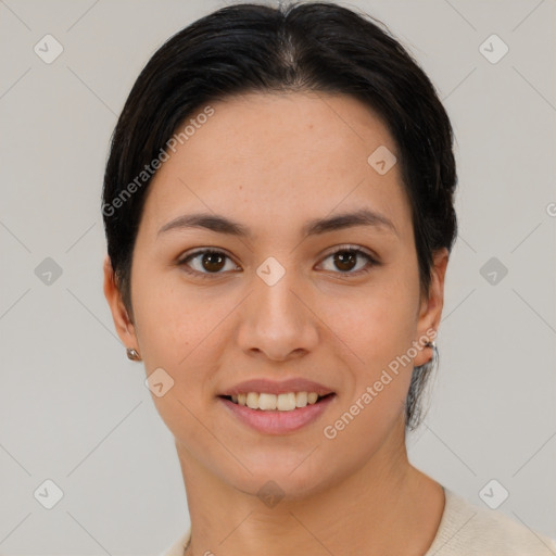 Joyful asian young-adult female with short  black hair and brown eyes