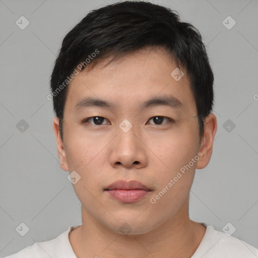 Neutral asian young-adult male with short  brown hair and brown eyes