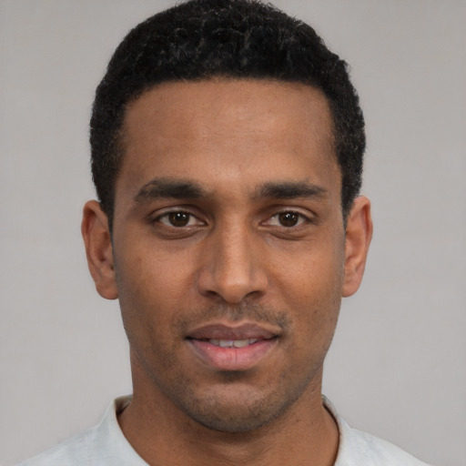 Neutral black young-adult male with short  black hair and brown eyes