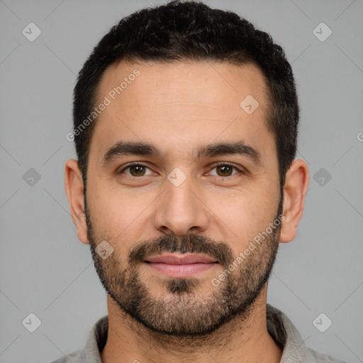 Joyful white young-adult male with short  black hair and brown eyes