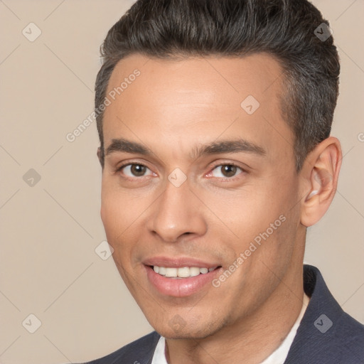 Joyful white young-adult male with short  brown hair and brown eyes