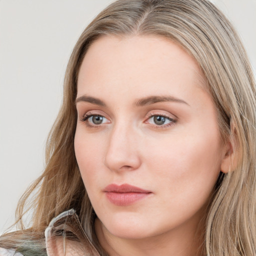 Neutral white young-adult female with long  brown hair and grey eyes