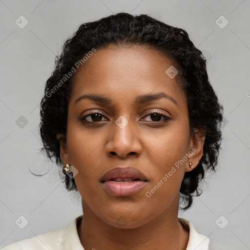 Joyful black young-adult female with medium  brown hair and brown eyes