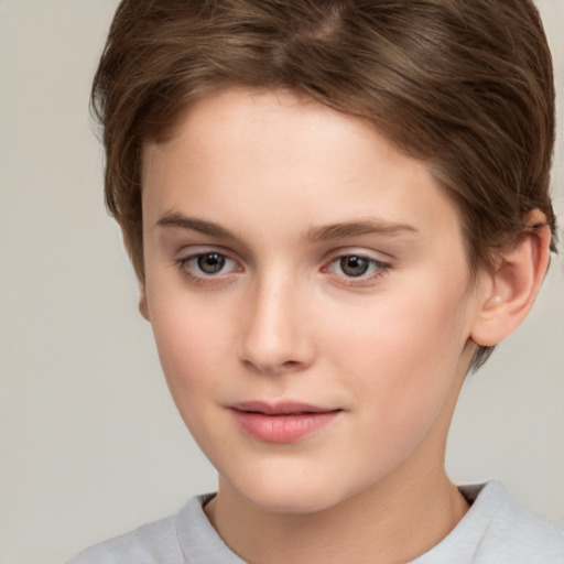 Joyful white child female with short  brown hair and brown eyes