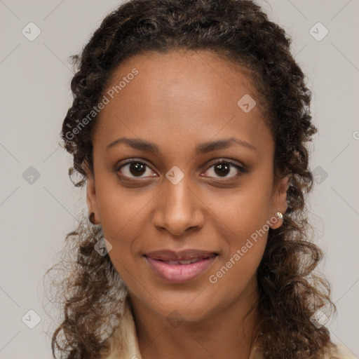 Joyful black young-adult female with medium  brown hair and brown eyes