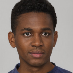 Neutral black young-adult male with short  brown hair and brown eyes