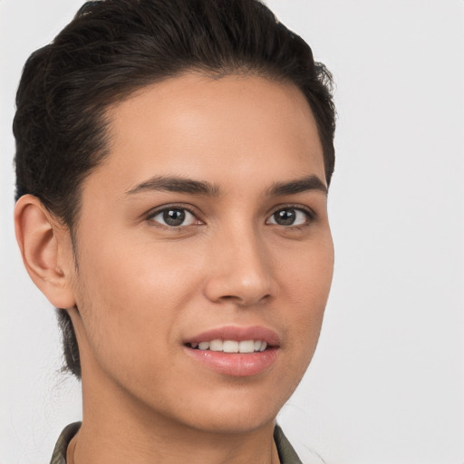 Joyful white young-adult female with short  brown hair and brown eyes