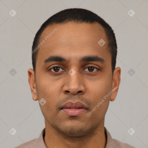 Neutral latino young-adult male with short  black hair and brown eyes