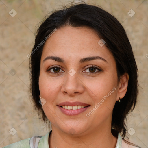 Joyful white adult female with medium  brown hair and brown eyes