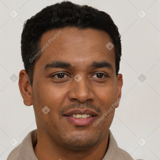 Joyful latino young-adult male with short  black hair and brown eyes