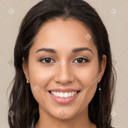 Joyful white young-adult female with long  brown hair and brown eyes