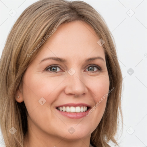 Joyful white young-adult female with long  brown hair and green eyes