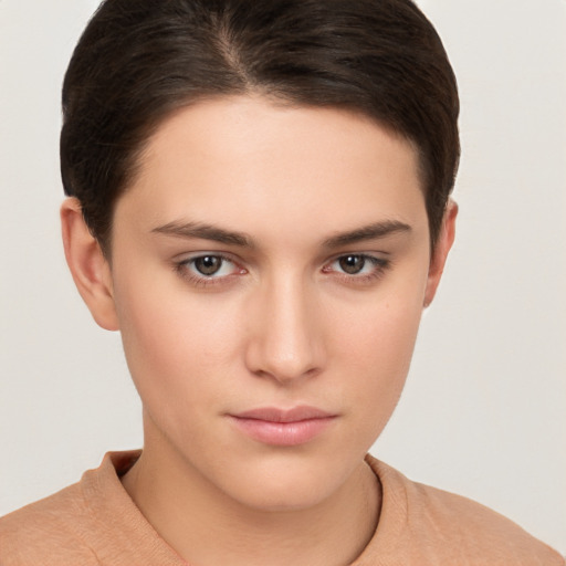 Neutral white young-adult female with short  brown hair and brown eyes