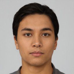 Neutral asian young-adult male with short  black hair and brown eyes