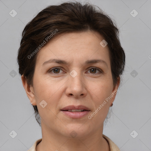 Joyful white adult female with short  brown hair and brown eyes