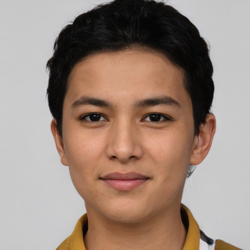Joyful asian young-adult male with short  black hair and brown eyes