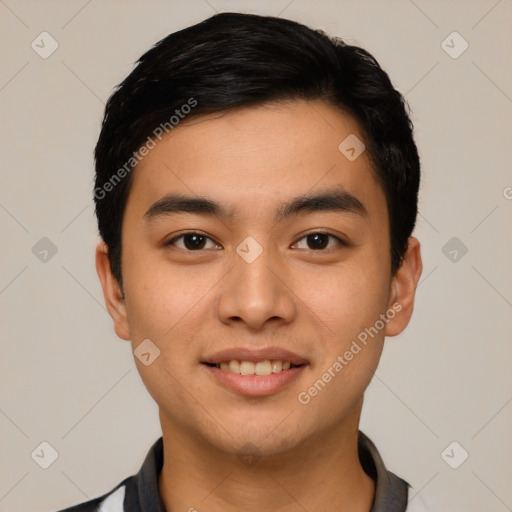 Joyful latino young-adult male with short  black hair and brown eyes