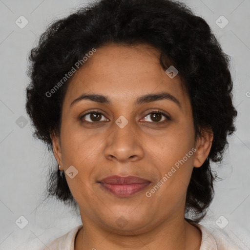 Joyful latino adult female with short  brown hair and brown eyes