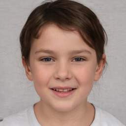 Joyful white child female with short  brown hair and brown eyes