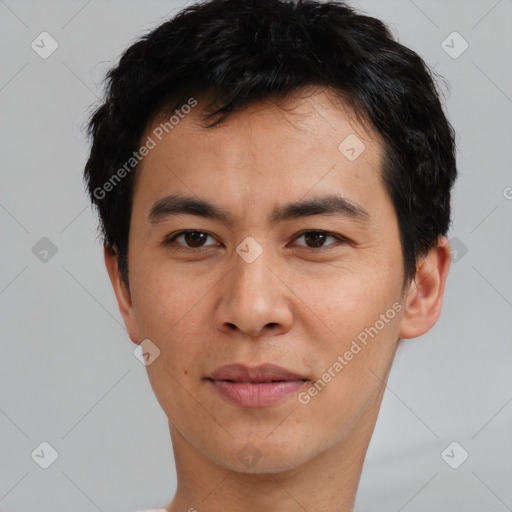 Joyful asian young-adult male with short  black hair and brown eyes