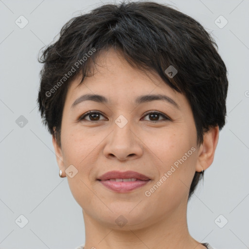 Joyful white adult female with short  brown hair and brown eyes