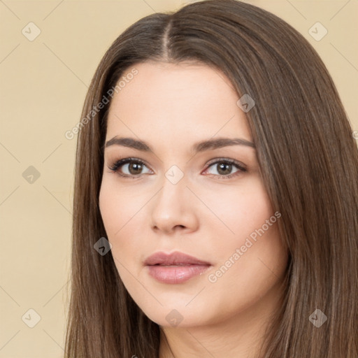 Neutral white young-adult female with long  brown hair and brown eyes