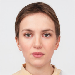 Neutral white young-adult female with short  brown hair and grey eyes