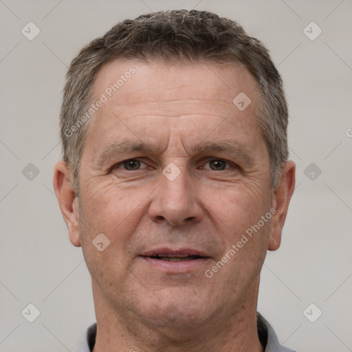 Joyful white middle-aged male with short  brown hair and grey eyes