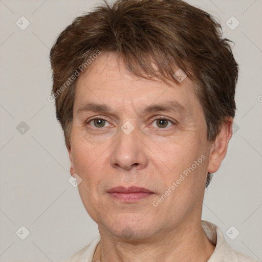 Joyful white adult male with short  brown hair and grey eyes