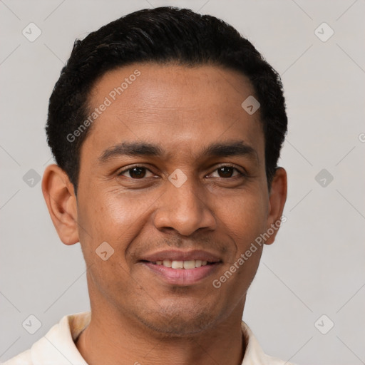 Joyful latino young-adult male with short  black hair and brown eyes