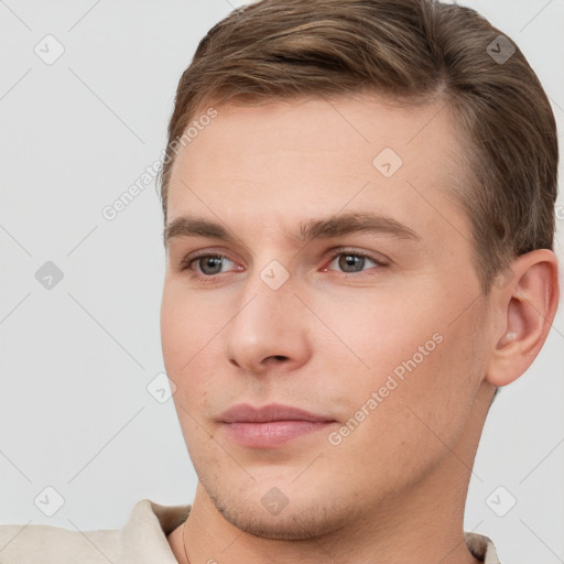 Neutral white young-adult male with short  brown hair and brown eyes