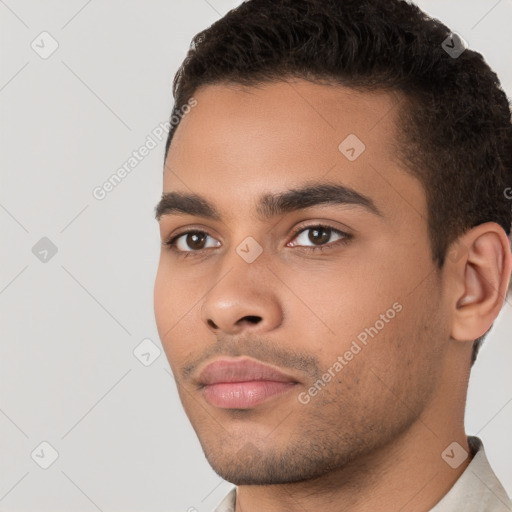 Neutral white young-adult male with short  black hair and brown eyes