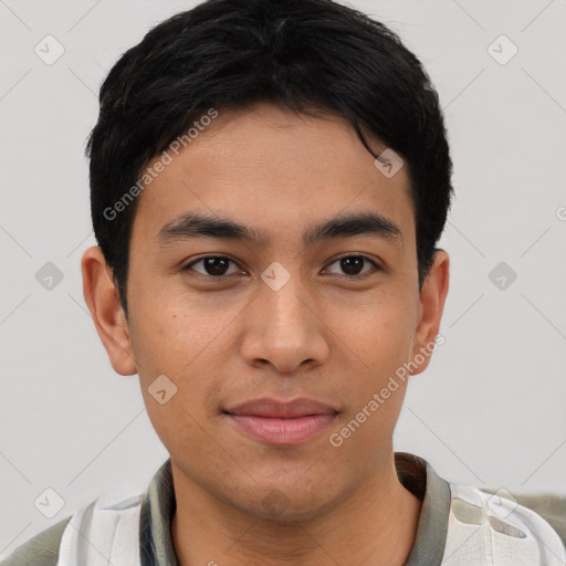 Joyful latino young-adult male with short  brown hair and brown eyes