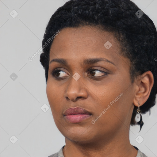 Neutral black young-adult female with short  black hair and brown eyes
