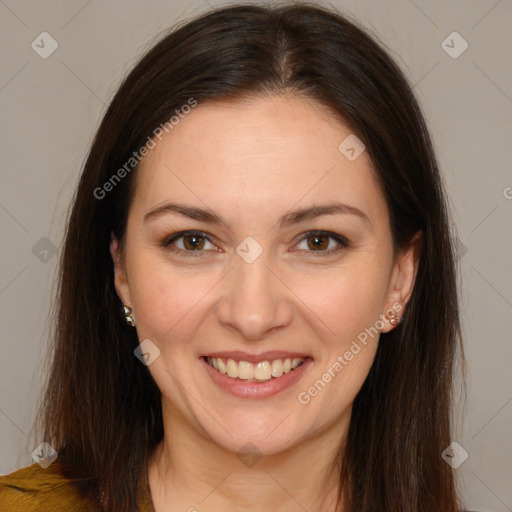 Joyful white young-adult female with long  brown hair and brown eyes