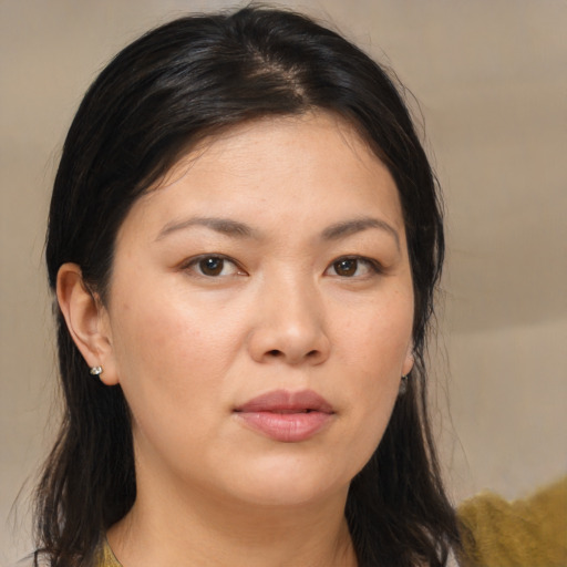 Neutral asian young-adult female with medium  brown hair and brown eyes