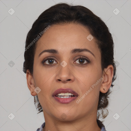 Joyful latino young-adult female with short  brown hair and brown eyes