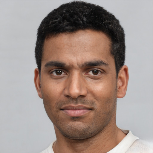 Neutral black young-adult male with short  black hair and brown eyes