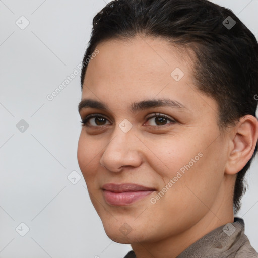 Joyful white young-adult female with short  brown hair and brown eyes