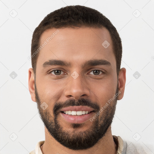 Joyful white young-adult male with short  brown hair and brown eyes