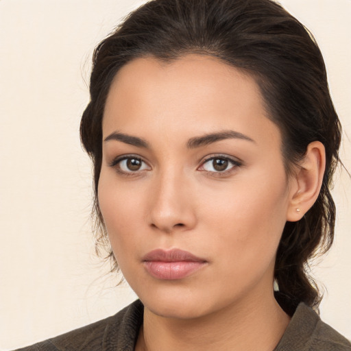 Neutral white young-adult female with medium  brown hair and brown eyes