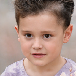 Joyful white child male with short  brown hair and brown eyes