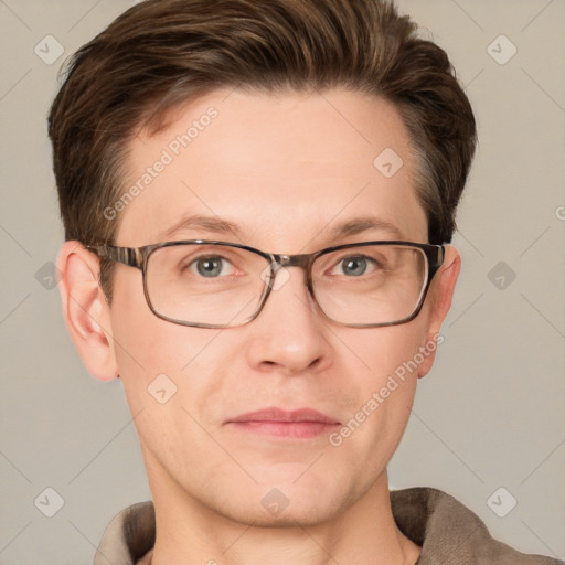 Joyful white adult male with short  brown hair and grey eyes