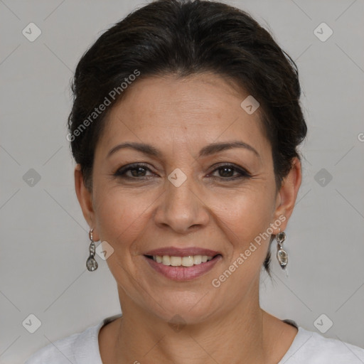 Joyful white adult female with short  brown hair and brown eyes