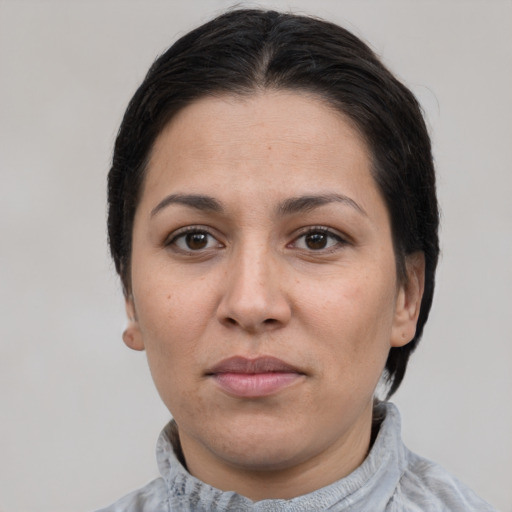 Neutral white adult female with short  brown hair and brown eyes