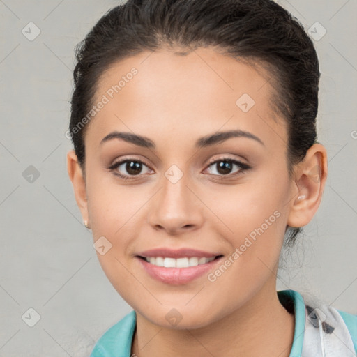 Joyful white young-adult female with short  brown hair and brown eyes